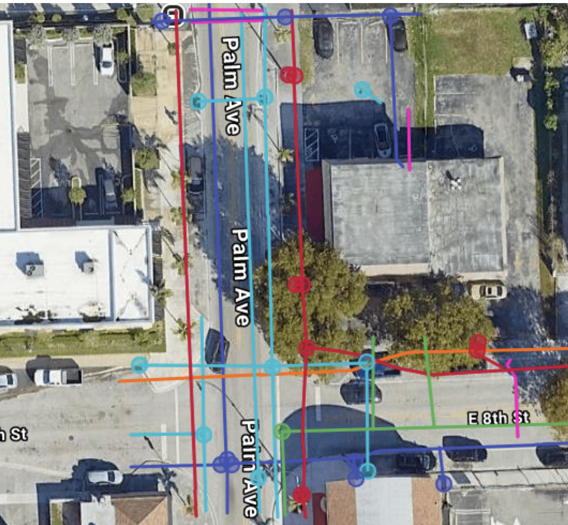 Aerial satellite view of Palm Avenue with APWA color-coded utility lines overlaid — underground utility mapping South Florida SUE